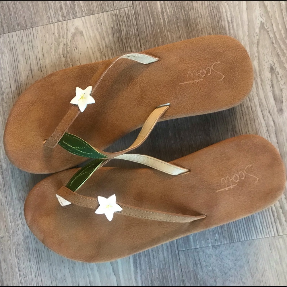 Flip flop sandals with a flower